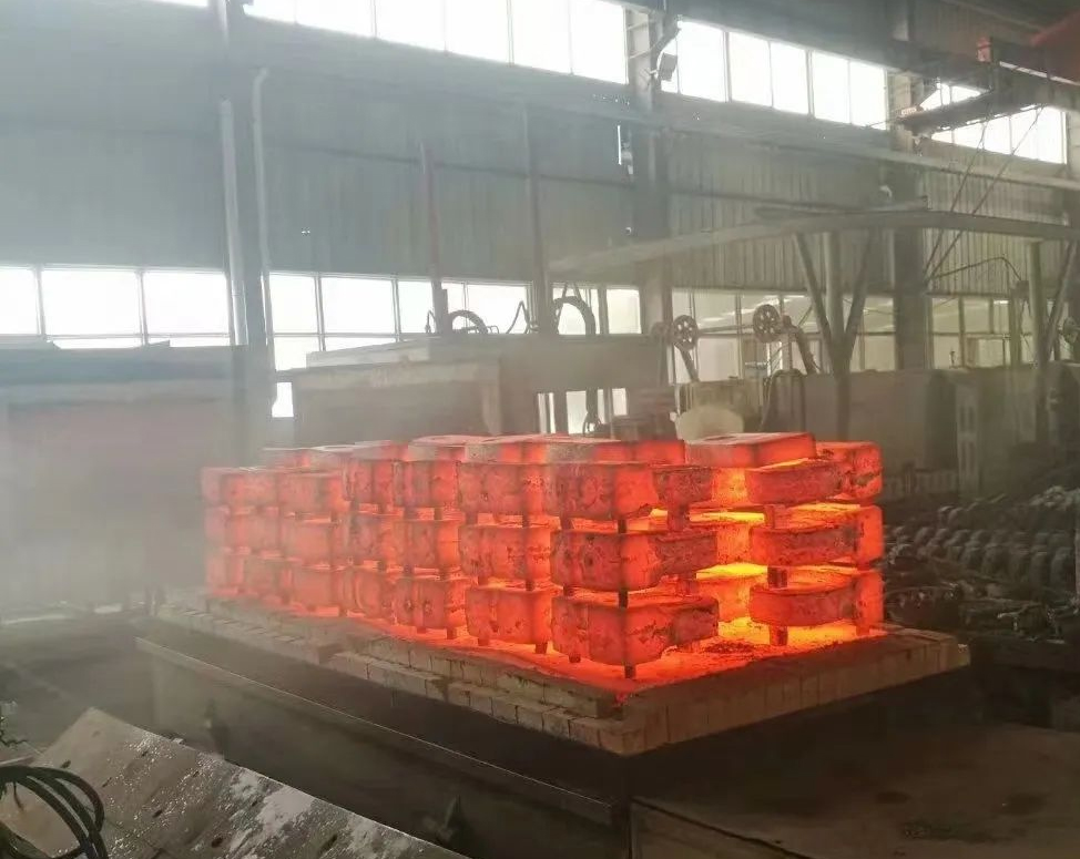 Heat treatment of high manganese steel castings